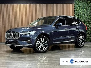 Volvo XC60 T6 AWD Recharge Bright Long Range | Trekhaak | All Season banden | Adaptieve Cruise Control | Stoelverwarming voor+achter | Stuurwielverwarming | Full LED Meesturende koplampen | Standkachel met Volvo On Call App | Pilot Assist | BLIS Dode Hoek Detectie | Lederen bekleding | Schuifdak | Parkeercamera | Google Infotainment | 18 Inch | Keyless Drive | Parkeersensoren voor+achter | Privacy Glass | Automatisch dimmende binenn en buitenspiegels | Regensensor | Climate Controle L+R | DAB Radio | Apple Carplay/Android Auto | Draadloos telefoon opladen | Volvo On Call met mobiele App functie | Denim Blue Metallic |