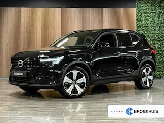 Volvo XC40 T5 Recharge Ultimate Dark | Trekhaak | Schuifdak | Harman Kardon | Parkeercamera | All Season banden | Adaptieve Cruise Control | Stoel en Stuurwielverwarming | Bestuurdersstoel elektrisch geheugen | Pilot Assist | BLIS Dode Hoek Detectie | Privacy Glass | 19 Inch | Passagiersstoel elektrisch | Microtech / alcantara bekleding met wit stiksel en bies | Zitting verlenging voorstoelen | Keyless Drive | Parkeersensoren voor+achter | Breedstralers in voorbumper | Regensensor | Elektrisch bedienbare achterklep | Automatisch dimmende binnen en buitenspiegels | Climate Control L+R | DAB Radio | Apple Carplay/Android Auto | Volvo On Call met mobiele App functie | Onyx Black Metallic |