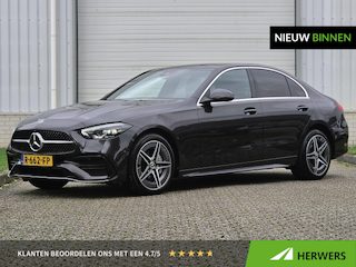 Mercedes-Benz C-klasse 300 e AMG Line / 1e Eigenaar / AMG Line / Panoramadak / Lederen Bekleding / Elektrische Stoelen / Stoel & Stuurverwarming / Sfeerverlichting / Achteruitrijcamera / Apple Carplay & Android Auto /