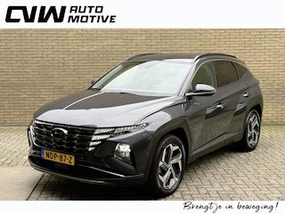 Hyundai Tucson 1.6 T-GDI 265pk PHEV Premium 4WD | Trekhaak afneembaar | Lederen bekleding | 360 camera | Navigatie | Stoelverwarming&ventilatie | Stuurverwarming | Keyless | LED | DAB| Apple CarPlay / Android Auto | Adaptieve cruise | Lane assist | Dodehoekdetectie | Elektrisch verstelbare stoel memory | Elektrische achterklep | Volledig dealeronderhouden | Fabrieksgarantie