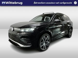 Volkswagen Tiguan 1.5 eHybrid R-Line / FABRIEKSGARANTIE TOT 02-2028/ AUTOMAAT/ LEDER/ TREKHAAK/ PANO/ MEMORY SEAT/ NAVI/ APP-CONNECT/ STOELVERWARMING & -KOELING/ 360 CAMERA