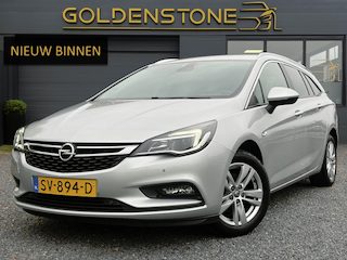 Opel Astra Sports Tourer 1.4 Online Edition ✓2e Eigenaar✓Trekhaak✓Carplay✓Navi✓Recent beurt gehad✓150pk✓Dealer Onderhouden✓6 Bak✓Pdc V+A✓Lm velgen✓Clima✓Cruise✓N.A.P✓Apk tot 06-2027