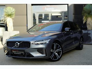 Volvo V60 2.0 T6 Recharge AWD R-Design | 340 PK | Panoramadak | Harman Kardon | 360° camera | Trekhaak | Volvo V60 2.0 T6 Recharge AWD R-Design met 340 PK, een 2.0-liter viercilinder plug-in hybride benzinemotor, panoramadak, premium Harman Kardon-audio, head-up display, 360°-camera, adaptieve c