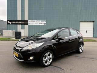 Ford Fiesta 1.25i Titanium 5-Deurs 82 PK. Zuinige en zeer fijn rijdende auto !!! Alle keuringen toegestaan !! Distributieriem en waterpomp vervangen bij 93.000 KM !