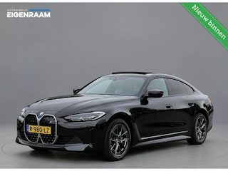 BMW i4 eDrive40 High Executive 84kWh soh 91,1% | Schuifdak | Memory Seats | Harman Kardon | EL. Trekhaak | Stoel/Stuurverwarming | Rijklaarprijs