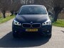 BMW 2-Serie Active Tourer 218i Centennial Executive MPV GROOT NAV ECC PDC NAP GOED ONDERHOUDEN