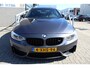 BMW M4 4-serie Coupé Nederlandse auto/Dealeronderhouden/M-Performance uitlaat/Carbon dak/Harman kardon/Lederen bekleding/Elektrisch verstelbare stoelen met geheugen/Navigatie/Keyless/Alarmsysteem/19 Inch