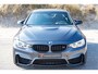 BMW M4 4-serie Coupé Nederlandse auto/Dealeronderhouden/M-Performance uitlaat/Carbon dak/Harman kardon/Lederen bekleding/Elektrisch verstelbare stoelen met geheugen/Navigatie/Keyless/Alarmsysteem/19 Inch