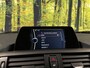 BMW 1-Serie 118i High Executive | Stoelverwarming | Parkeersensoren Achter | Stop/Start systeem | Bluetooth |