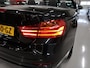 BMW 4-Serie Cabrio 430i High Executive Sport 252pk Zwart Leer Navigatie Bluetooth Nekverwarming Stoelverwarming Head-up display Sportvelgen Stuurverwarming Sportstoelen PDC Boekjes nette staat Airco-ecc