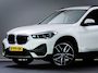 BMW X1 SDrive 18i High Executive Edition (HEAD-UP DISPLAY, TREKHAAK AFNEEMBAAR, NAVIGATIE PROFESSIONAL, STOELVERWARMING, AIRCO)