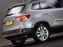 Skoda Karoq 1.5 TSI ACT Ambition Business (SCHUIF-/KANTELDAK, APPLE CARPLAY/ANDROID AUTO, NAVIGATIESYSTEEM, CLIMATE CONTROL, NAP)