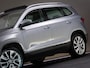 Skoda Karoq 1.5 TSI ACT Ambition Business (SCHUIF-/KANTELDAK, APPLE CARPLAY/ANDROID AUTO, NAVIGATIESYSTEEM, CLIMATE CONTROL, NAP)