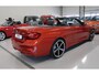 BMW M4 4-serie Cabrio Sakhir Orange, BTW auto, 20 inch AC Schnitzer velgen Head-Up Navigatie Harman-Kardon Leer Nekverwarming Nieuwstaat! BMW dealer onderhouden