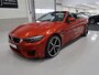 BMW M4 4-serie Cabrio Sakhir Orange BTW auto 20 inch AC Schnitzer Head-Up Navigatie Harman-Kardon Leer Nekverwarming Nieuwstaat! BMW dealer onderhouden