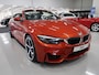 BMW M4 4-serie Cabrio Sakhir Orange BTW auto 20 inch AC Schnitzer Head-Up Navigatie Harman-Kardon Leer Nekverwarming Nieuwstaat! BMW dealer onderhouden