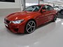 BMW M4 4-serie Cabrio Sakhir Orange, BTW auto, 20 inch AC Schnitzer velgen Head-Up Navigatie Harman-Kardon Leer Nekverwarming Nieuwstaat! BMW dealer onderhouden