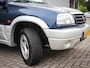 Suzuki Grand Vitara 1.6 Metal Top Wide Body | Audio | Elektrische ramen | Two tone kleur | Centrale vergrendeling |
