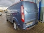Ford Transit Custom 300 2.0 TDCI L2H1 Trend 130pk SCI | Automaat | Driver Assistance Pack Premium | Navigatiesysteem | Camera| Reservewiel | Chrome Blue Metallic