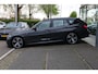 BMW 3-Serie Touring 330i High Executive M-PAKKET PANO DEALER OND.!