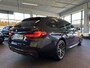 BMW 5-Serie Touring 520i High Executive M Sport | Facelift | Panoramadak | Luxe lederen bekleding | Laser-LED | Nederlands geleverd | Memory seats | Sfeerverlichting | Apple carplay | Adaptief onderstel | Keyless | Cruise control | Climate control | Stoelverwarming | Unieke