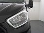 Ford Transit Custom 2.0TDCI 130PK 3-persoons Airco PDC Trekhaak Cruise-Controle Adaptieve bochtverlichting Voorruit Verwarmbaar Betonplex Schuifdeur-r Tussenwand Led 320 L1H1 Projector-koplamp mistlampen regen-/lichtsensor Zeer Compleet! EURO 6 385Nm 2.500kg Trekvermogen!