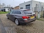 BMW 5-Serie Touring 530d High Executive Heeft tik in de motor!