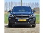 BMW X1 18d sDrive High Executive / head-up display / panoramadak / camera achter / zwart leer