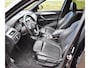 BMW X1 18d sDrive High Executive / head-up display / panoramadak / camera achter / zwart leer