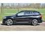 BMW X1 18d sDrive High Executive / head-up display / panoramadak / camera achter / zwart leer