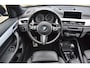 BMW X1 18d sDrive High Executive / head-up display / panoramadak / camera achter / zwart leer