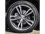 BMW X1 18d sDrive High Executive / head-up display / panoramadak / camera achter / zwart leer