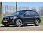 BMW X1 18d sDrive High Executive / head-up display / panoramadak / camera achter / zwart leer