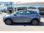 Ford Puma 1.0-125pk EcoBoost Hybrid Titanium. Garantie t/m 21-05-2027 ! Slechts 14.750km ! Volautm. airco, metallic lak, stoel-, stuur- en voorraamverwarming, navigatie, telefoonvoorbereiding, elektrische achterklep, cruise cntrl, keyless entry / keyless go etc.