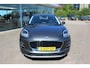 Ford Puma 1.0-125pk EcoBoost Hybrid Titanium. Garantie t/m 21-05-2027 ! Slechts 14.750km ! Volautm. airco, metallic lak, stoel-, stuur- en voorraamverwarming, navigatie, telefoonvoorbereiding, elektrische achterklep, cruise cntrl, keyless entry / keyless go etc.