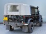 Land Rover Defender BWJ 2005 2.5 123 PK Td5 110" S High Capacity AIRCO | PRIV. GLAS | 16 INCH BORBET LMV | APPLE CARPLAY | ANDROID AUTO | CAMERA | TREKHAAK | TUSSENBAK MET LANGERE OVERBRENGING
