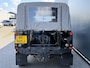 Land Rover Defender BWJ 2005 2.5 123 PK Td5 110" S High Capacity AIRCO | PRIV. GLAS | 16 INCH BORBET LMV | APPLE CARPLAY | ANDROID AUTO | CAMERA | TREKHAAK | TUSSENBAK MET LANGERE OVERBRENGING