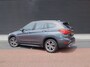 BMW X1 sDrive20i Centennial High Executive | Clima | Cruise | Navi | Leder | Stoelverwarming | Pano | Parkeer-assistent |