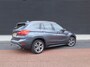 BMW X1 sDrive20i Centennial High Executive | Clima | Cruise | Navi | Leder | Stoelverwarming | Pano | Parkeer-assistent |