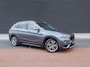 BMW X1 sDrive20i Centennial High Executive | Clima | Cruise | Navi | Leder | Stoelverwarming | Pano | Parkeer-assistent |