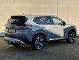 Nissan X-Trail 1.5 e-4orce Tekna 4WD 7p. / Full Options / 7 Persoons! / Trekhaak 1.650 KG Trekgewicht / Lederen bekleding / 3-Zone Climate Control / Parkeersensoren Voor + Achter / Adaptieve Cruise Control / Navigatie / Stoel- & Stuurverwarming / Groot Scherm / Elektrische Achterklep / Elektrische Stoelen /