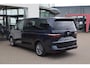 Volkswagen Multivan 1.5 eHybrid L2 Bulli Edition 4Motion 245PK / 180kW Achteruitrijcamera, LED Matrix IQ.Light, panoramadak, verwarmbare voorstoelen, elektrisch bedienbare achterklep, Apple Carplay & Android Auto, Keyless Entry & Start, dodehoeksensor met correctie, dynamische grootlichtassistent, verwarmbare voorruit, 3-zone Climatronic, volledig digitaal instrumentenpaneel (Digital Cockpit Pro), adaptive cruise control, navigatie, vierseizoensbanden 18'' LMV
