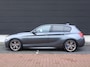 BMW 1-Serie M140i Centennial Executive | Handbak | Clima | Cruise | Navi | Alcantara | M-Sport | PDC | LED | Multimedia |