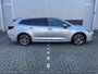 Toyota Corolla Touring Sports 1.8 Hybrid First Edition | Electrische achterklep | Parkeersensoren V + A | Half lederen bekleding | Via de app voorverwarmen/koelen