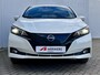 Nissan Leaf e+ Tekna 59 kWh Automaat / Accu SoH 100% / Pro Pilot Adaptieve CC / Dode hoek detectie / Navigatie / Camera 360° / Leer / Apple Carplay Android / Stuur-, stoel- en achterbankverwarming /