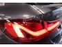 BMW 1-Serie M135i xDrive High Executive Edition 306PK Headup Display Sportuitlaat Navigatie PDC VCP Cruise Control 19LMV  Volleder interieur Schaal stoelen