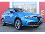 Alfa Romeo Tonale 1.3T PHEV Q4 280PK Edizione Speciale | PANORAMISCH SCHUIF / KANTELDAK | HARMAN CARDON PREMIUM AUDIO  | LEDEREN BEKLEDING | VOORSTOELEN / STUUR VERWARMD | VOORSTOELEN GEVENTILEERD | VOORSTOELEN ELEKTRISCH VERSTELBAAR MET GEHEUGEN FUNCTIE | APPLE CARPLAY / ANDROID AUTO | 360° CAMERA | DODEHOEK DETECTIE | 20"INCH LICHTMETALEN VELGEN | ADAPTIVE CRUISE CONTROL | KEYLESS ENTRY / START | ELEKTRISCH BEDIENBARE ACHTERKLEP | DRAADLOZE TELEFOONLADER | SFEER VERLICHTING | DONKERE HEMELBEKLEDING |