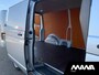 Volkswagen Transporter 2.0TDI L2H1 28 Airco Cruise Sensoren Trekhaak Betonplex Airbag 12V CarPlay Wandbekleding Bijrijdersbank DIN