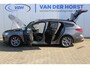 Ford Focus Wagon 1.0-125pk EcoBoost ST-Line X. Geweldig mooie, luxe en sportieve Focus wagon ! Slechts 12.000km ! Autm. airco, stoel-, stuur- en voorraamverw., ergonomische stoelen, adaptieve cruise cntrl, side- en lane assist, elektr. panodak, B&O soundsyst., etc.