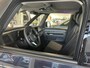 Volkswagen ID. Buzz Cargo Bedrijfswagens Bulli edition Elektromotor 210 kW (286 pk) 79 kWh | Open & Close Pakket | Hoge scheidingswand met vaste ruit en dimbare binnenspiegel | Trekhaak, elektrisch uitklapbaar, mechanisch inklapbaar | Verlichte strip tussen koplampen inclusief verlichte handgrepen |